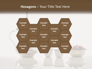 A Silver Tea Pot And Cups On A Table PowerPoint Template