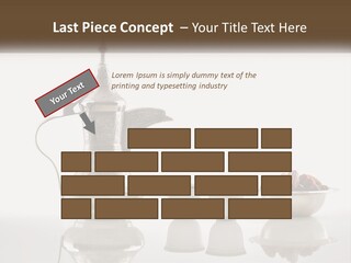 A Silver Tea Pot And Cups On A Table PowerPoint Template