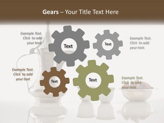 A Silver Tea Pot And Cups On A Table PowerPoint Template