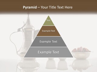 A Silver Tea Pot And Cups On A Table PowerPoint Template