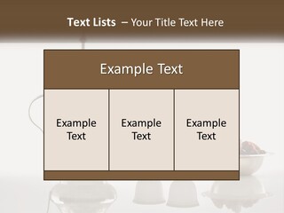 A Silver Tea Pot And Cups On A Table PowerPoint Template