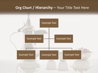 A Silver Tea Pot And Cups On A Table PowerPoint Template