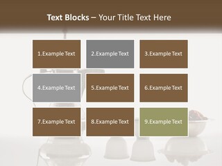 A Silver Tea Pot And Cups On A Table PowerPoint Template