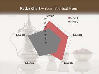 A Silver Tea Pot And Cups On A Table PowerPoint Template