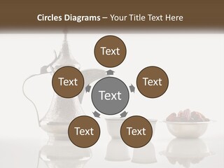 A Silver Tea Pot And Cups On A Table PowerPoint Template