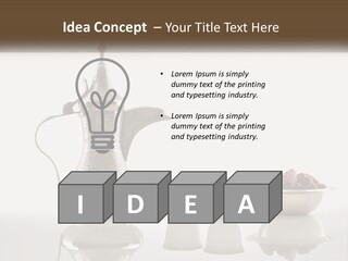 A Silver Tea Pot And Cups On A Table PowerPoint Template