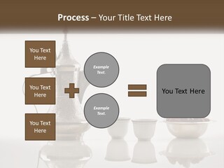 A Silver Tea Pot And Cups On A Table PowerPoint Template