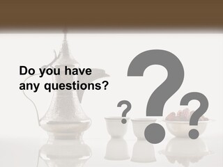 A Silver Tea Pot And Cups On A Table PowerPoint Template