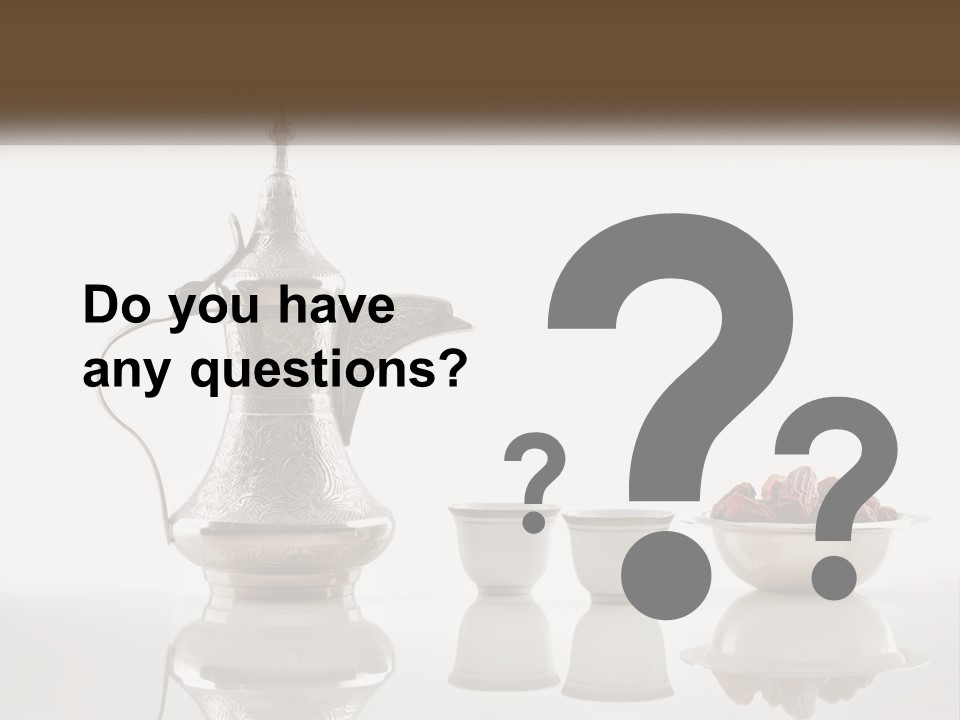 A Silver Tea Pot And Cups On A Table PowerPoint Template