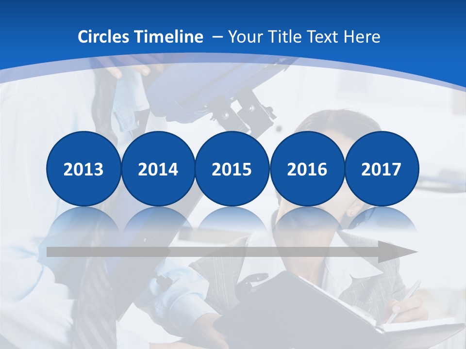 A Man Sitting In A Blue Chair Next To A Woman PowerPoint Template