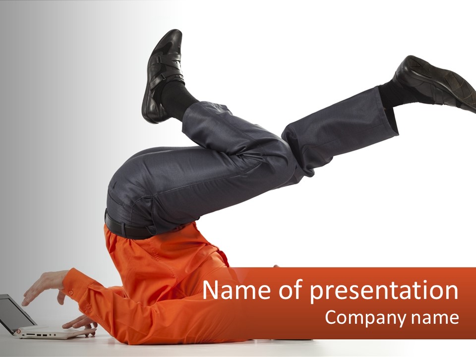 A Man Laying On The Ground With A Laptop PowerPoint Template