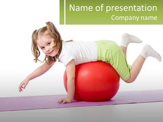 A Little Girl Is Laying On Top Of A Ball PowerPoint Template