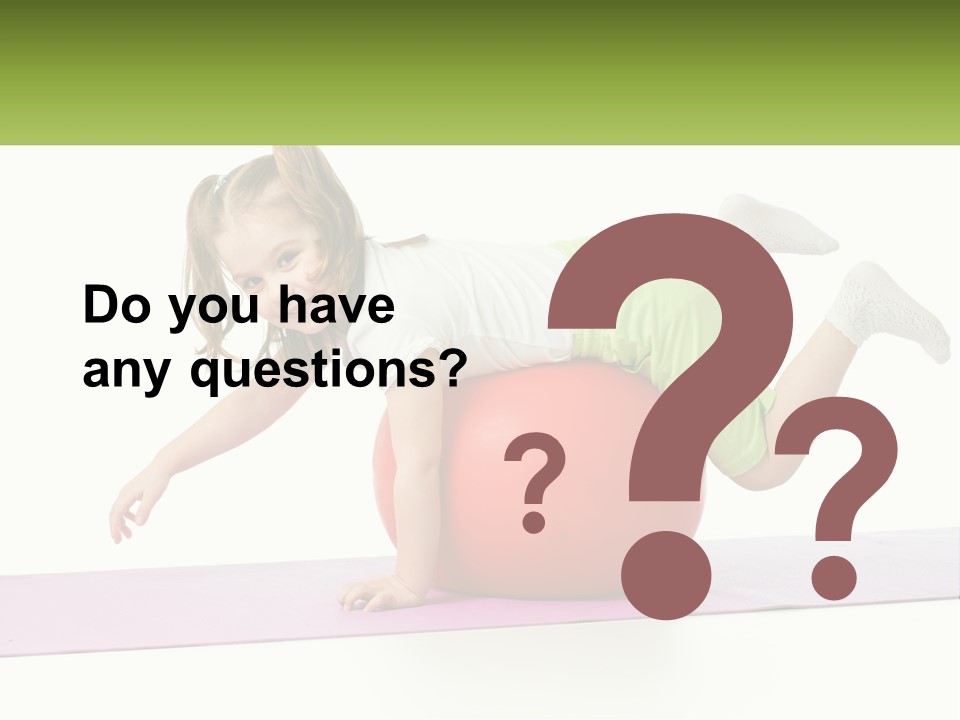 A Little Girl Is Laying On Top Of A Ball PowerPoint Template