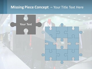 Two Mannequins Dressed In Black And White In A Clothing Store PowerPoint Template