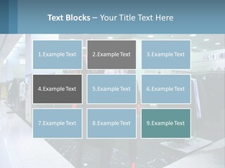 Two Mannequins Dressed In Black And White In A Clothing Store PowerPoint Template