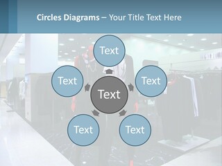 Two Mannequins Dressed In Black And White In A Clothing Store PowerPoint Template