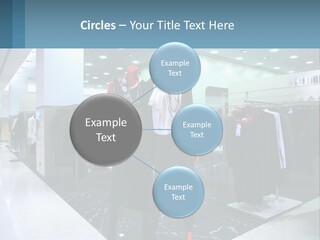 Two Mannequins Dressed In Black And White In A Clothing Store PowerPoint Template