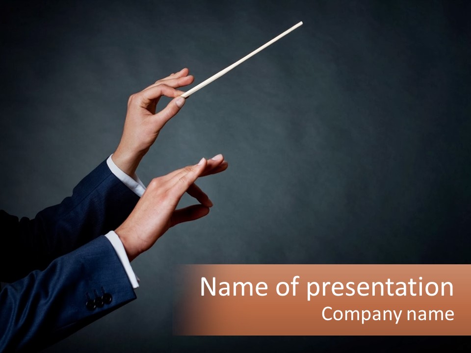 A Person Holding A Conductor's Baton In Their Hand PowerPoint Template