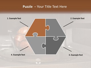 A Glass Bowl Filled With Apples On Top Of A Stove PowerPoint Template