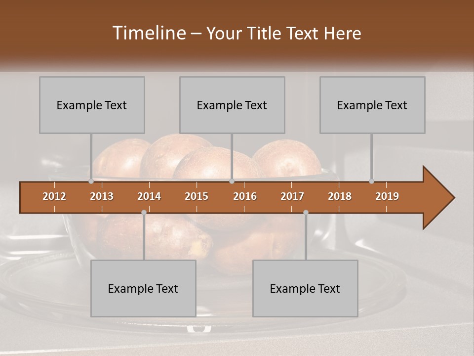 A Glass Bowl Filled With Apples On Top Of A Stove PowerPoint Template