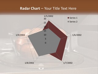 A Glass Bowl Filled With Apples On Top Of A Stove PowerPoint Template