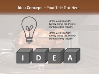 A Glass Bowl Filled With Apples On Top Of A Stove PowerPoint Template