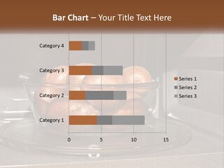 A Glass Bowl Filled With Apples On Top Of A Stove PowerPoint Template