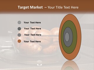A Glass Bowl Filled With Apples On Top Of A Stove PowerPoint Template