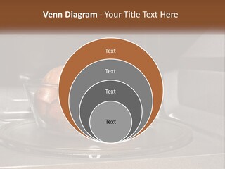 A Glass Bowl Filled With Apples On Top Of A Stove PowerPoint Template