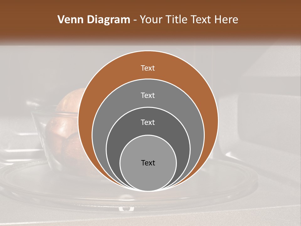 A Glass Bowl Filled With Apples On Top Of A Stove PowerPoint Template