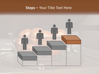 A Glass Bowl Filled With Apples On Top Of A Stove PowerPoint Template