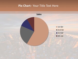 An Aerial View Of A City At Sunset PowerPoint Template