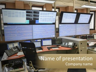 A Room Filled With Lots Of Computer Screens PowerPoint Template