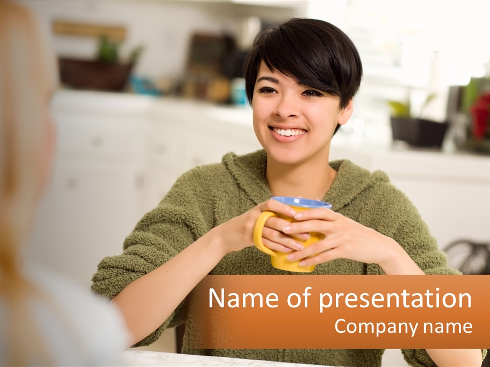 A Woman Sitting At A Table With A Cup In Her Hands PowerPoint Template