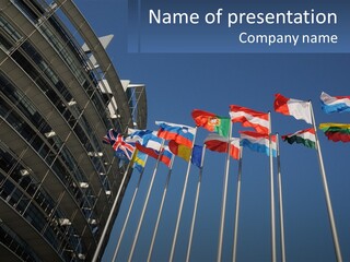 A Group Of Flags Flying In Front Of A Building PowerPoint Template