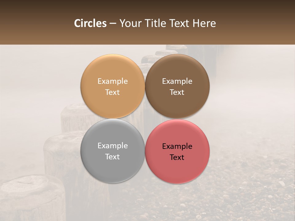 A Row Of Wooden Logs Sitting On Top Of A Beach PowerPoint Template