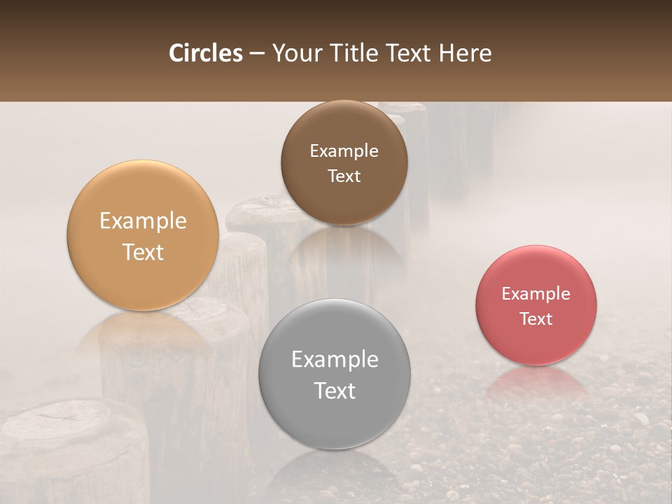 A Row Of Wooden Logs Sitting On Top Of A Beach PowerPoint Template