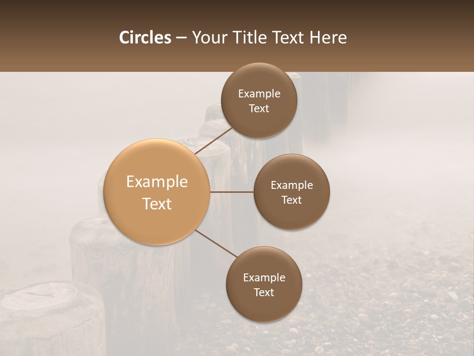 A Row Of Wooden Logs Sitting On Top Of A Beach PowerPoint Template