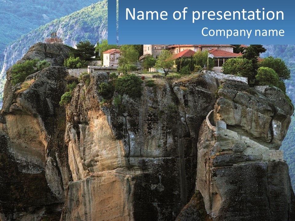 A Large Cliff With A House On Top Of It PowerPoint Template
