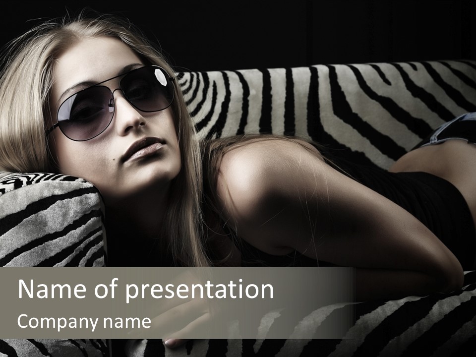 A Woman Laying On Top Of A Zebra Print Couch PowerPoint Template