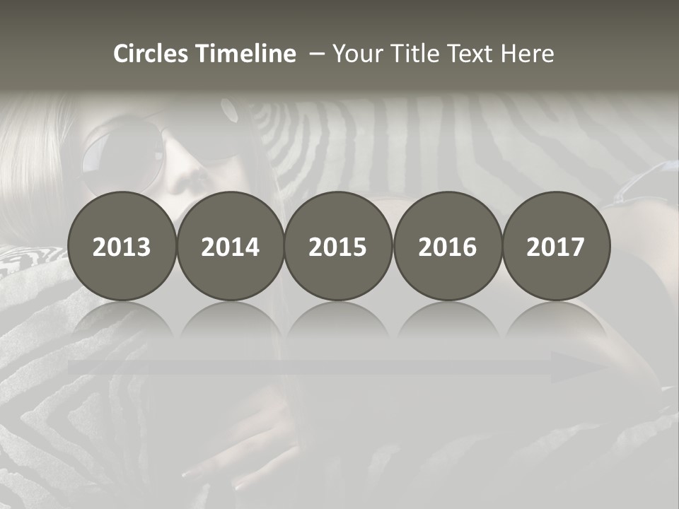 A Woman Laying On Top Of A Zebra Print Couch PowerPoint Template