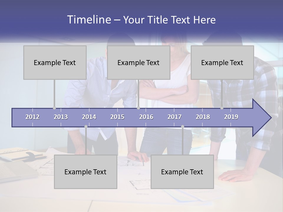 A Group Of People Looking At A Computer Screen PowerPoint Template