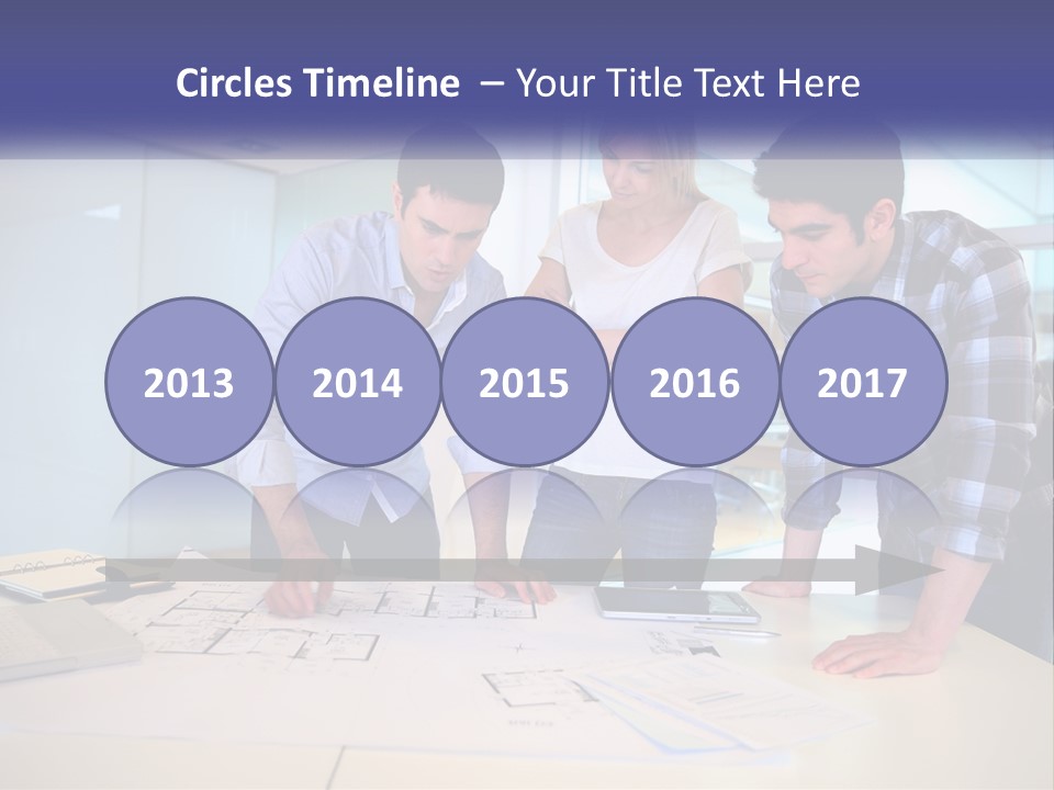 A Group Of People Looking At A Computer Screen PowerPoint Template