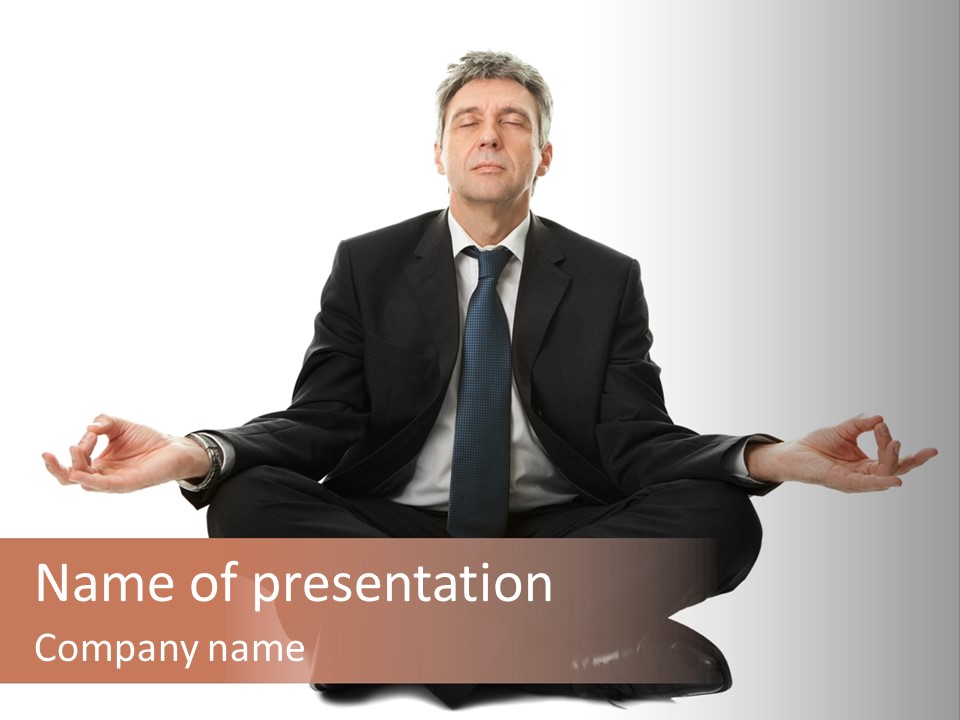 A Man In A Suit And Tie Sitting In A Yoga Position PowerPoint Template