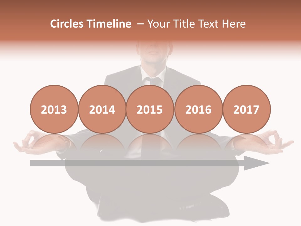 A Man In A Suit And Tie Sitting In A Yoga Position PowerPoint Template