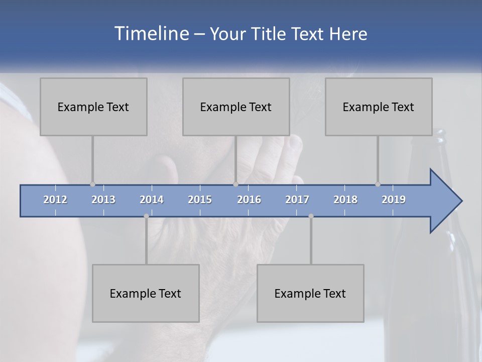 A Man Holding His Face Next To A Bottle Of Beer PowerPoint Template