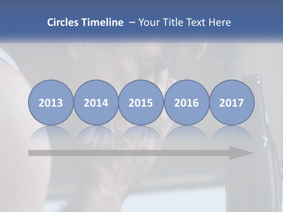 A Man Holding His Face Next To A Bottle Of Beer PowerPoint Template