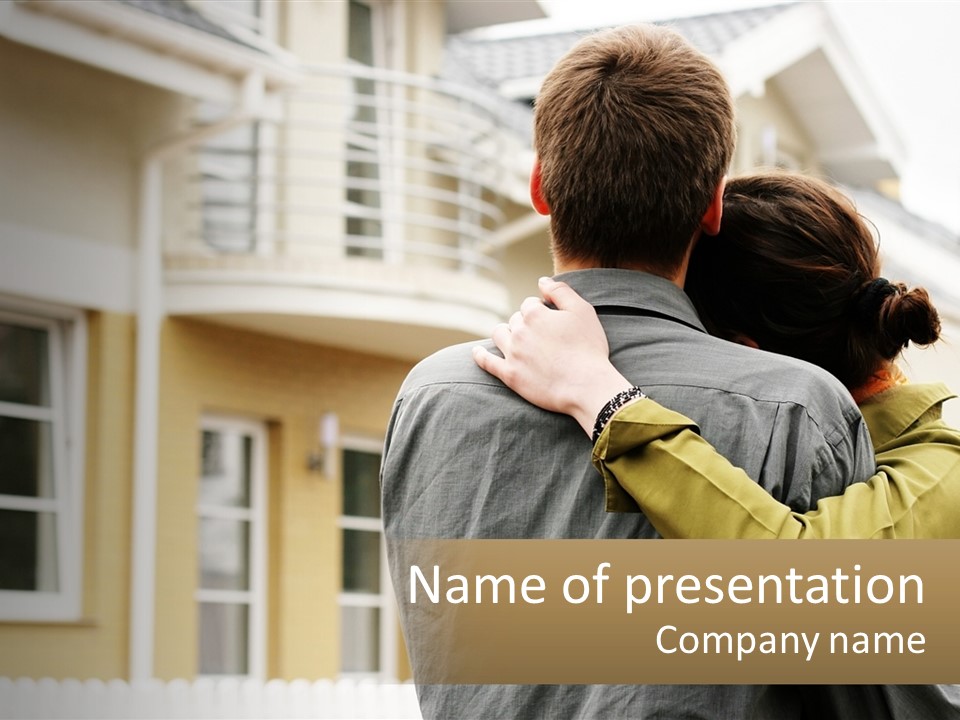 A Man And Woman Hugging In Front Of A House PowerPoint Template