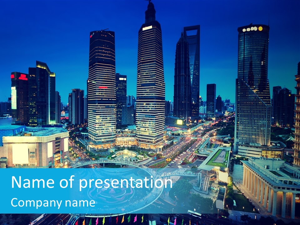 A Cityscape With Skyscrapers In The Background At Night PowerPoint Template