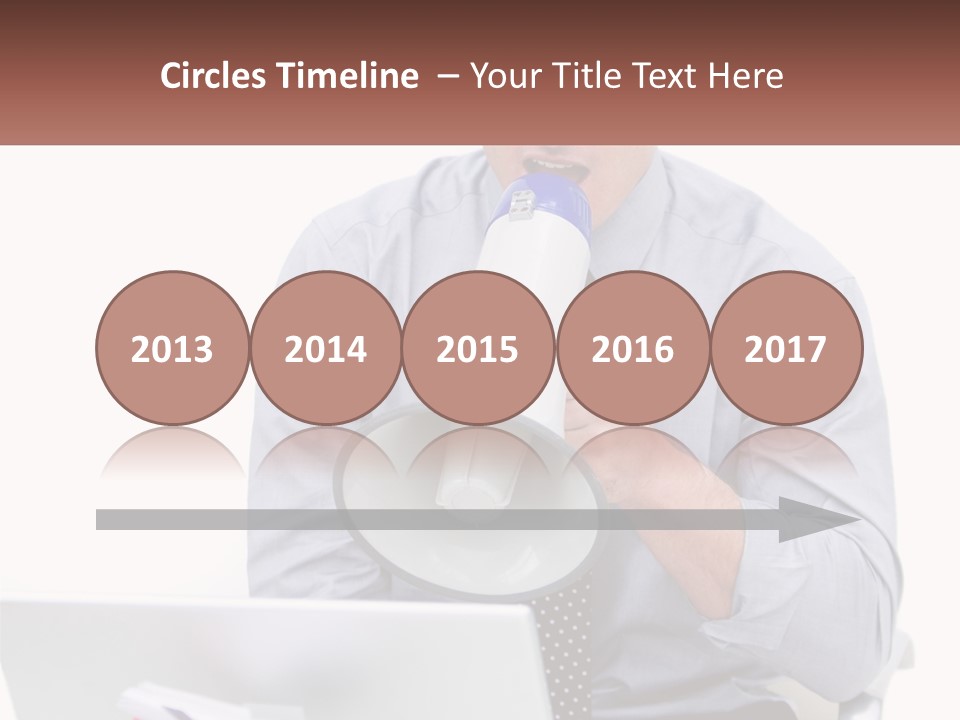 A Man Holding A Megaphone In Front Of A Laptop PowerPoint Template